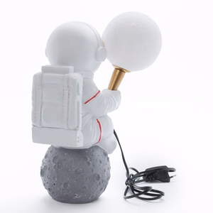 Mėnulio stalo lempa ASTRONAUTAS sėdintis Art Deco (modelis 4) AMTL
