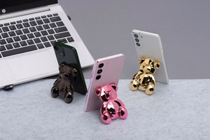 Lipnus telefono stovas BEAR - auksinis