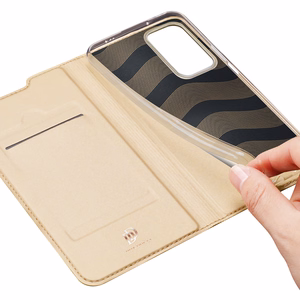 Dux Ducis Skin Pro atverčiamas dėklas telefonui Xiaomi Poco F4 5G auksinis