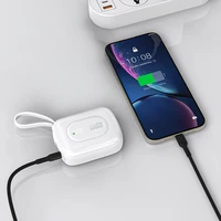Dudao K32 22.5W 10000mAh išorinė baterija su įmontuotu USB-C / Lightning kabeliu - balta