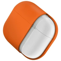 Uniq Nexo AirPods 4 + ausų kabliukų silikoninis dėklas - oranžinis