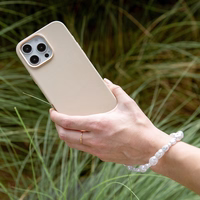 UNIQ Coehl Perla Handstrap universalus telefono rankinis dirželis baltas/baltas pearl