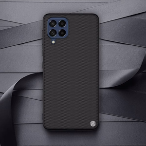 Nillkin Tekstūrinis dėklas patvarus sustiprintas dėklas su geliniu rėmu ir nailonine nugarėle Samsung Galaxy M53 5G juodas