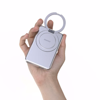 Dudao K28 10000mAh PD 22.5W Magnetinė išorinė baterija su metaliniu dėklu ir žiedo stovu - sidabrinė