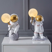 Mėnulio stalo lempa ASTRONAUTAS stovintis Art Deco (modelis 1) AMTL