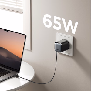 Joyroom JR-TCL02 65W USB-A USB-C GaN įkroviklis su įmontuotu USB-C kabeliu - juodas