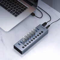 "Orico BT2U3-10AB" 10x USB-A 3.0 šakotuvas su jungikliais - pilkas