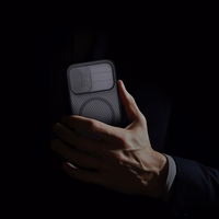 "Nillkin CamShield Pro MagSafe" suderinamas dėklas "iPhone 17" - skaidrus, juodas