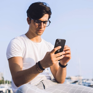 Spigen Glas.tR EZ Fit Optik Kameros apsauginis stiklas iPhone 14 / Plus / 15 / Plus - juodas 2 vnt