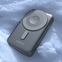 Dudao K29 10000mAh PD 20W Magnetinė išorinė baterija su metaliniu dėklu, stovu ir įmontuotais USB-C/Lightning kabeliais - pilka