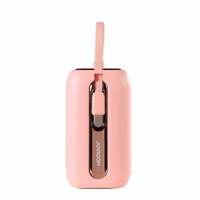 Joyroom mini išorinė baterija 10000mAh Colorful Series 22.5W su 2 įmontuotais USB C ir Lightning kabeliais rožinė (JR-L012)