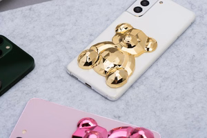 Lipnus telefono stovas BEAR - auksinis