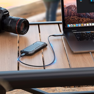 Orico OXS2C3-G2 M.2 NVMe/SATA SSD USB-C 3.2 taktinis sustiprintas diskų dėklas - pilkas
