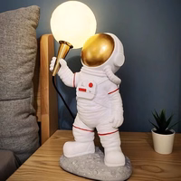 Mėnulio stalo lempa ASTRONAUTAS stovintis Art Deco (modelis 1) AMTL