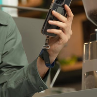 UNIQ Vista universal telefono dirželis 2in1 šviesiai bordo