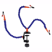 Lituoklio laikiklis trečiosios rankos pagalba su 3 rankomis