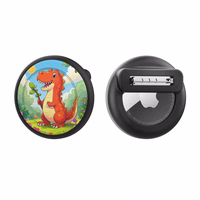 AirTag ženklo dėklas - juodas su dinozaurų spauda