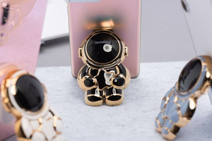 Lipnus telefono stovas ASTRONAUT - juodas