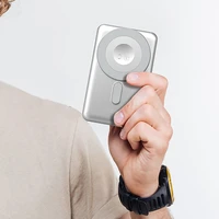 Dudao K29 10000mAh PD 20W Magnetinė išorinė baterija su metaliniu dėklu, stovu ir įmontuotais USB-C/Lightning kabeliais - sidabrinė