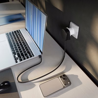 Adapteris iš US sieninio kištuko į universalų kištuką