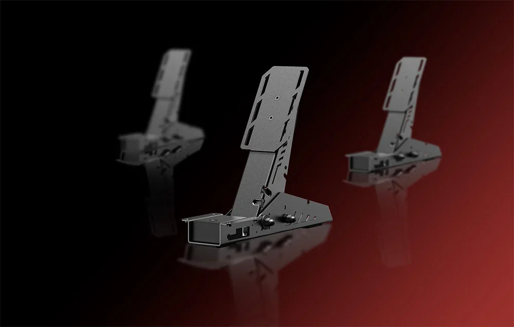 PXN clutch pedal in graphite color shown from the side with fuzzy copies in the background on a gradient background