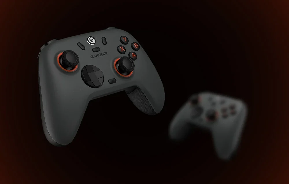 A dark gray GameSir controller with red highlights floating on a dark background with a blurry second controller in the background.
